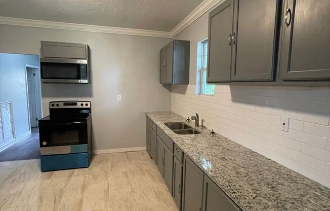 Completely renovated 4/2 Single Family home ! Available now!
