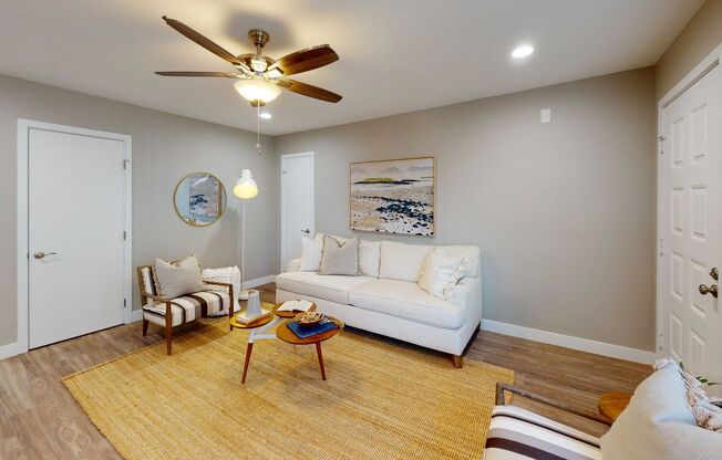 Sunnyside - RENOVATED! Coastal, two bedroom apartment home with in-unit W/D, A/C, and underground parking