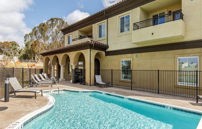 Pool with a gate to access showers and bathrooms