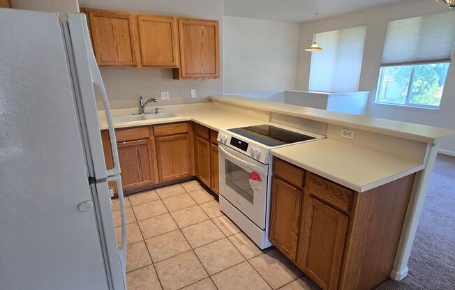 Spacious Townhome with Oversized 2-Car Garage in Lakewood--Ready for Move in!!
