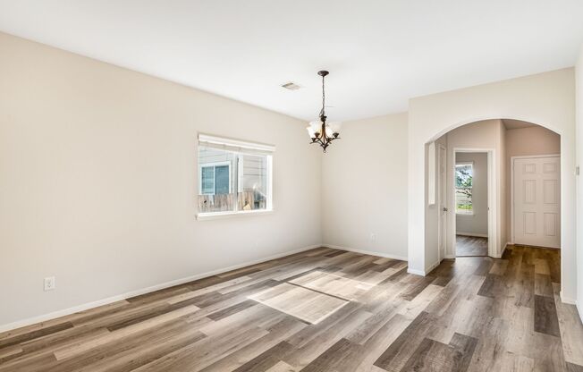 Charming 3-bedroom, 2-bath single-family home with a spacious 2-car garage.