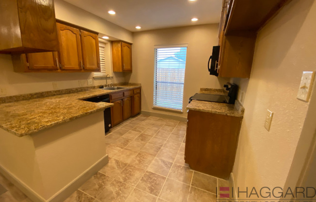 Rare 3-bed,2-bath, 1-story half duplex recently updated! Ready for move-in.