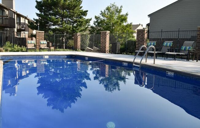 the pool is clean and ready for use at the apartments