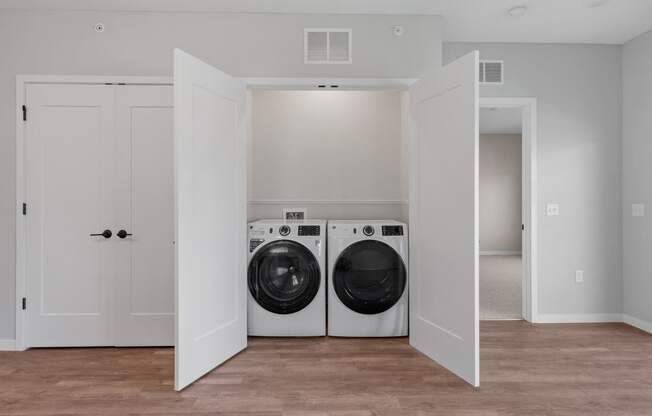 our apartments offer a laundry room with a washer and dryer at The Lodge at Overland, Rochester, Minnesota