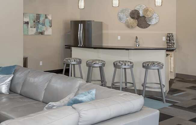 Kitchen area with barstools at windsor gates apartments