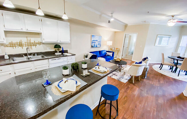 Open kitchen with dining nook at The Villas at Katy Trail in Uptown Dallas, TX, For Rent. Now leasing Studio, 1, 2 and 3 bedroom apartments.