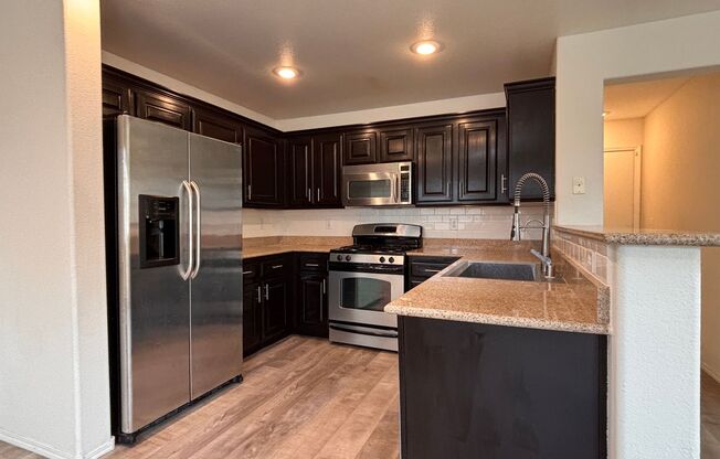 Beautifully maintained two-story, three-bedroom, two-and-a-half-bath single-family home