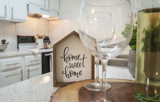 This is a photo of the kitchen in the 653 square foot 1 bedroom apartment at Princeton Court Apartments in Dallas, TX.