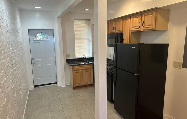 Charming 2-Bedroom, 1.5-Bathroom Brick Townhouse in Pigtown
