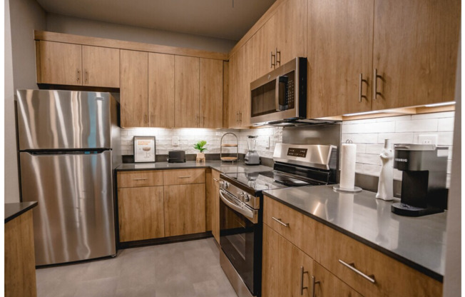 2 beds, 2 baths, 1,037 sqft, $1,225, Unit B-04/WHITE CABINET/ PARKING LOT VIEW