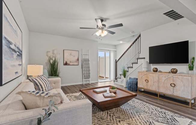 a living room with a couch and a coffee table