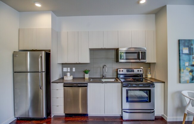 AVAILABLE NOW - EastBank Quarters #4 - Corner Unit High Ceilings and Ample Windows!
