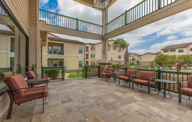 a row of wooden benches sitting on top of a building