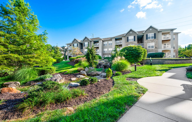 take a stroll through our landscaping at the enclave at woodbridge apartments in sugar land,