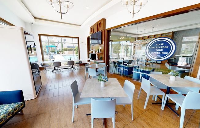 Apt Cowork Space at The Marq Highland Park Showing Privacy Pod and Working Tables