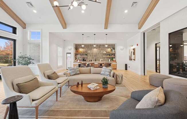 A living room with a brown and white color scheme.