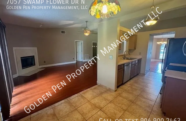 7057 SWAMP FLOWER DR N