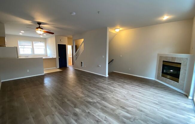 Fantastic Townhome with Gas Fireplace, Deck, Fenced Yard, and Vaulted Ceilings