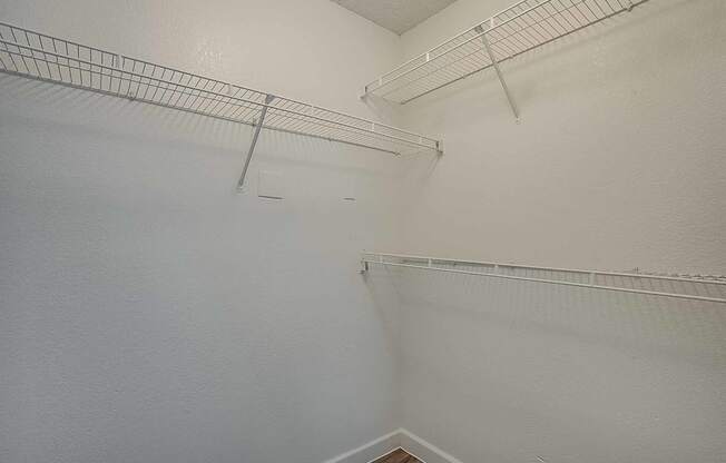 Empty white room with shelving at Sterling Point Apartment Homes, Arizona