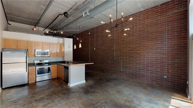 Awesome and modern loft condo for lease in Uptown Charlotte's tree lined Fourth Ward neighborhood!