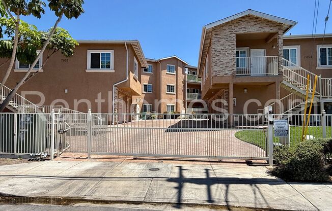 Linda Vista, 7056 Fulton St #14, Gated Complex, City Views, Granite Counters, Wood Floors, 1 Car Garage.