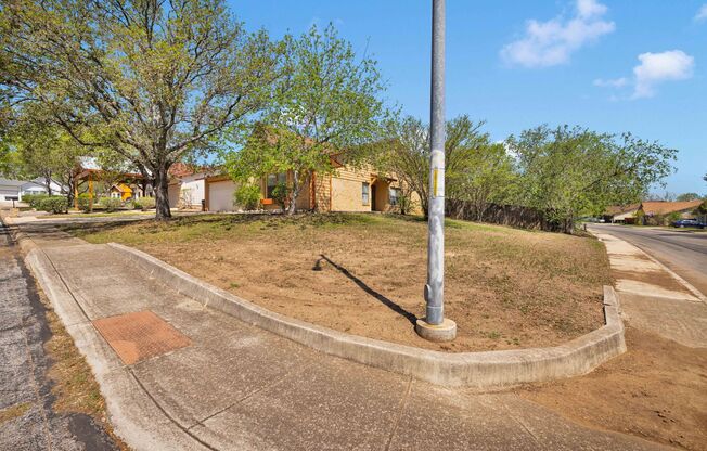 Stunning corner lot home offering convenient accessibility and spacious living.