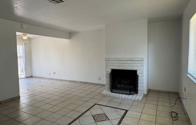 Two Bedroom Triplex with One Bathroom and Garage