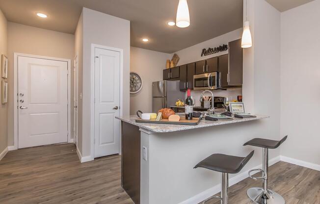 a kitchen with a table in a room