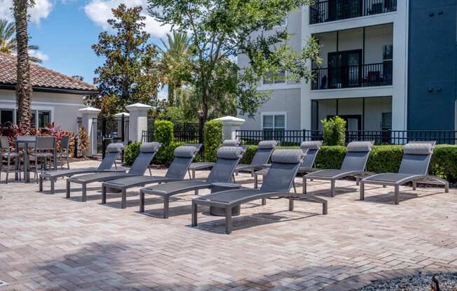 A sundeck with chairs at Verano apartments