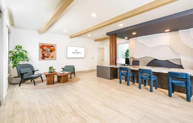 The welcoming resident lobby features designer seating areas, a hospitality-inspired reception experience, and contemporary finishes throughout.