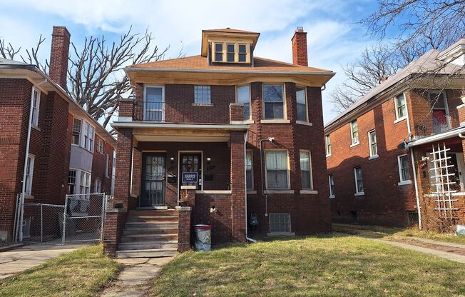 Brick Upper with multiple decks in Highand Park