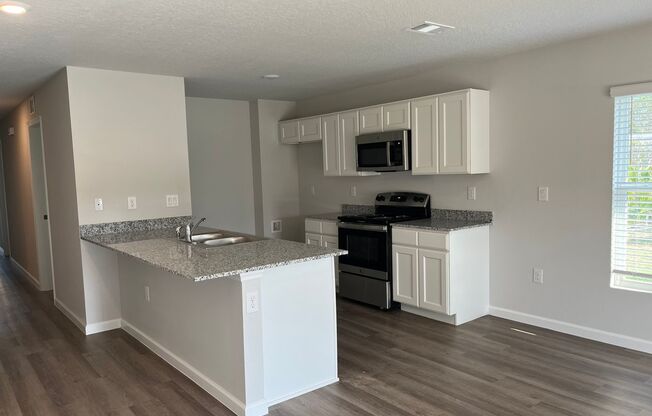 Beautiful 4 Bedroom Home with Huge yard!