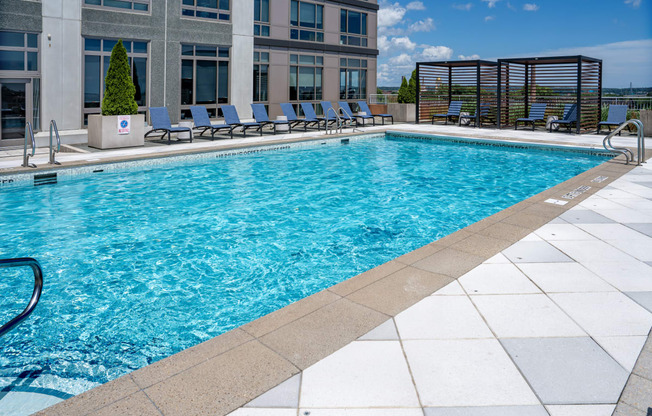 Ample pool side seating & cabanas