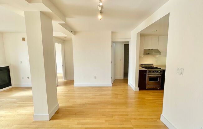 Top Floor 2 bed / 2 bath, city views from private balcony, Garage, In Unit Laundry, Centrally Located Condo, Pet ok - PROGRESSIVE