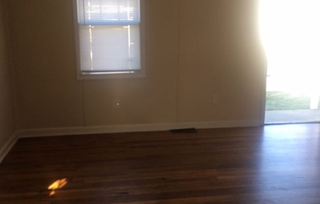 Bungalow with fully fenced back  yard    250520