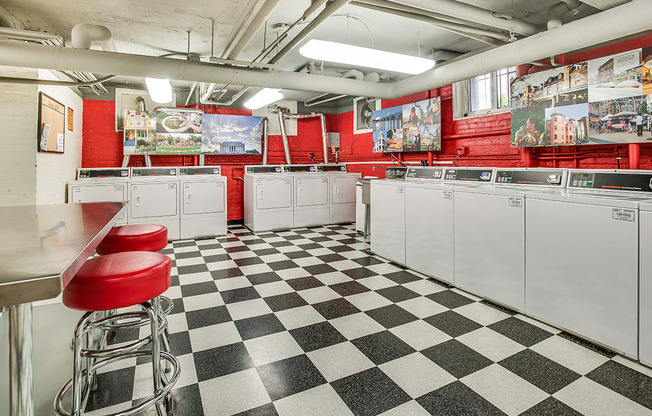 Laundry room with seating area at Highview and Castle Manor, Washington, DC