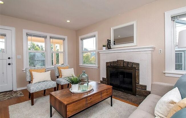 $1000 Off w/ move in by 10/15 - Charming Ballard Home with Modern Upgrades & Classic Front Porch + Garage