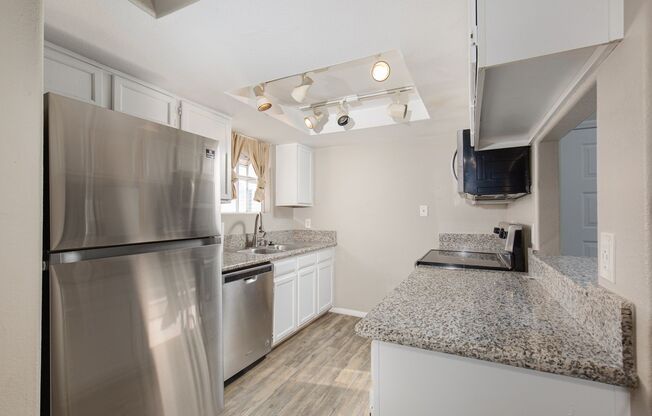 2nd floor unit in gated community with pool/spa/tennis