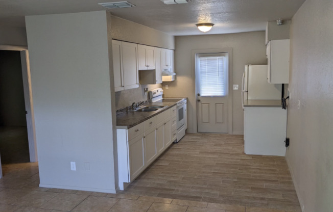 3755 66 AVE N