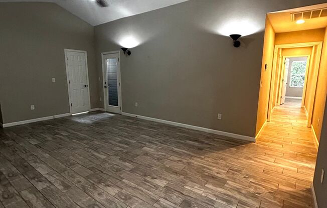 Large new in 2022 home with 2 car garage, fenced year and open spaces.
