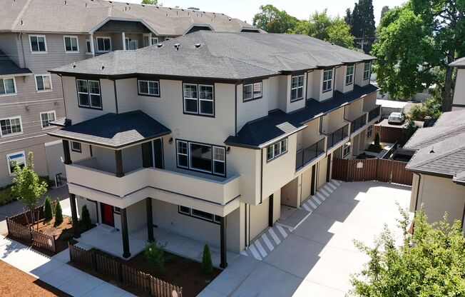 4 Bedroom / 4 bath New Townhome. Every bedroom is its own Master Suite with your own full bathroom, walk in closet and A/C unit. Full-size washer and dryer in your unit.