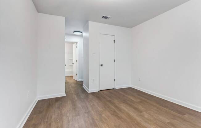 Whitney Manor Apartments in Gretna, LA photo of  bedroom with hardwood flooring