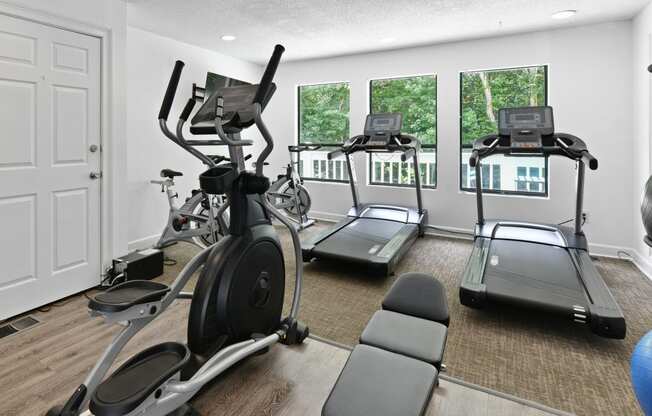 the gym at the district flats apartments in lenexa