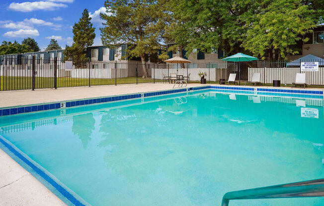 the swimming pool at our apartments with a resort style pool