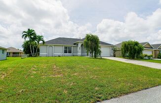 Great location! 3 beds 2 bath and fence yard home with double car garage