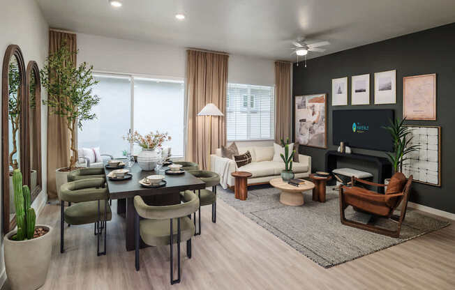 A modern living room with a dining table set for six.