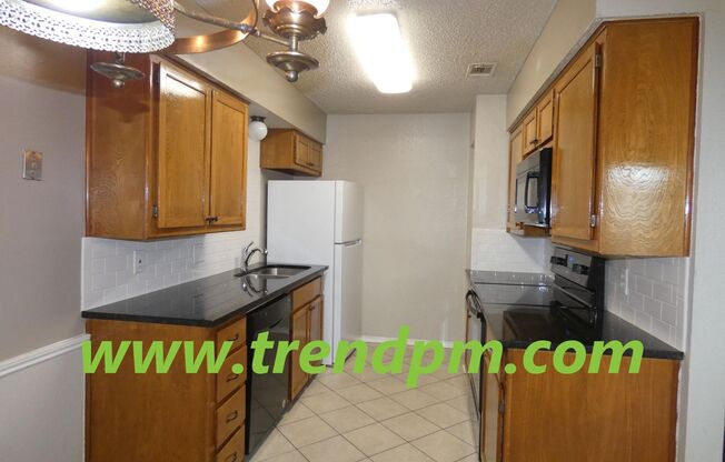 Updated 2 bedroom/2 bath townhome with 1 car garage in centrally located Saginaw! 412 Asbury Drive, Saginaw, TX 76179