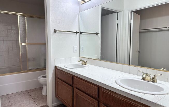 1 BEDROOM / 1 BATHROOM WITH SHOWER AND 1 OFFICE DOWNSTAIR. 3 BEDROOMS UPSTAIRS. VAULTED CEILING IN LIVING ROOM. SEP FAMILY ROOM WITH FIREPLACE. TILE COUNTERTOP WITH BREAKFAST BAR. STORAGE CABINETS IN GARAGE. FULLY LANDSCAPE IN FRONT AND BACK YARD. HOUSE L