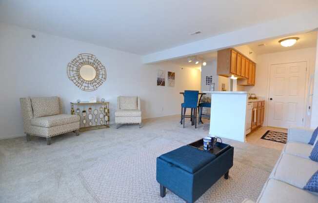 a living room with a couch a chair and a table