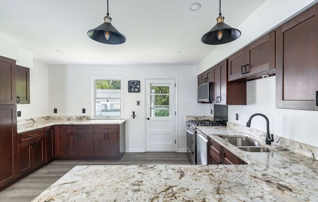 Drexel Hill: Modern 3-Bedroom Home with Backyard Oasis!